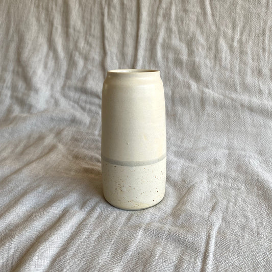 matte white vase with speckle and blue